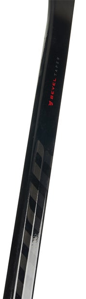 Bâton De Hockey Warrior Novium SP - Intermédiaire - Composite Carbone - Noir