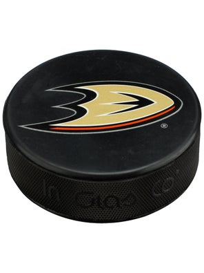 What are NHL pucks made of?