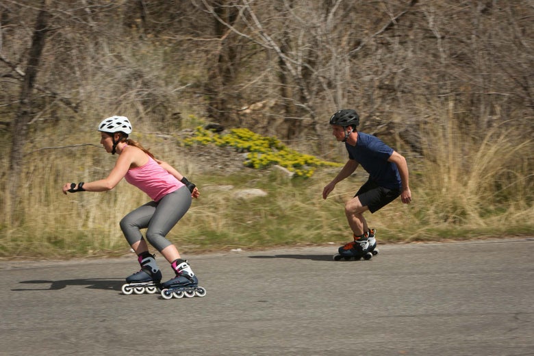 Man and woman cross-training with Maxxum skates