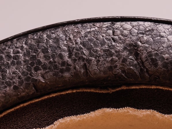 Close up of small cracks in the EPS foam of a skate helmet