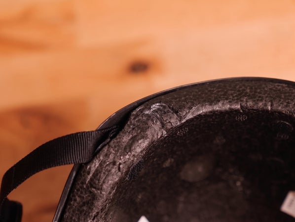Close up of damaged EPS foam in a skate helmet